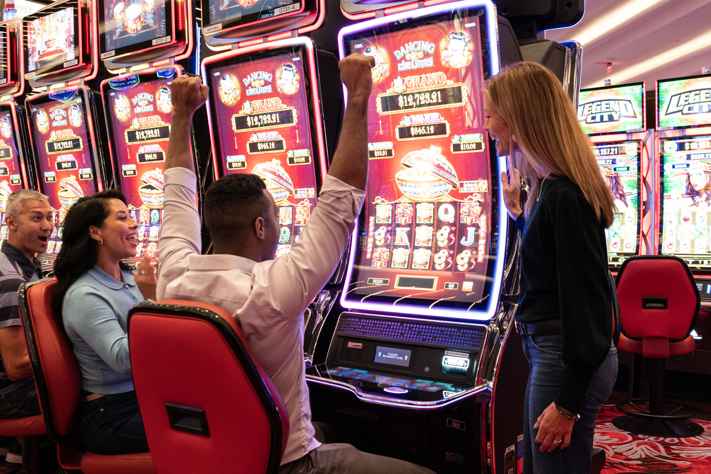 Guest at slot machine with big win
